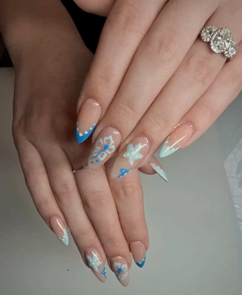 Blue Hibiscus press-on nails handcrafted by Nail Oasis