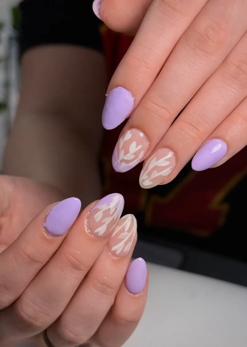 Lavender French tip nails with white flowers