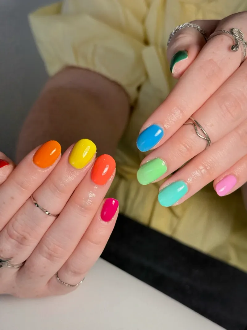 Rainbow gel manicure in bright solid colours
