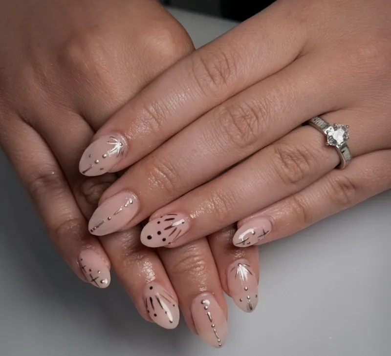 Silver Western Chrome press-on nails handcrafted by Nail Oasis